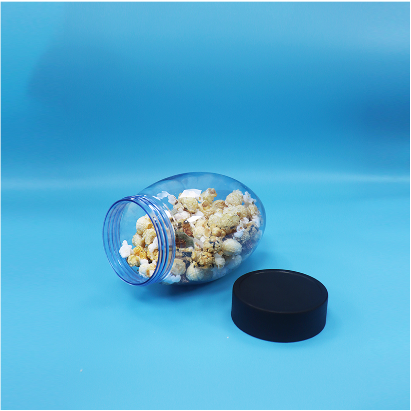 Einzigartige Ei-förmige Kunststoff-Süßigkeiten Popcorn Pistazien-Nuss-Süßigkeiten-Glas Upside Down Flat Cap