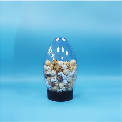 Einzigartige Ei-förmige Kunststoff-Süßigkeiten Popcorn Pistazien-Nuss-Süßigkeiten-Glas Upside Down Flat Cap